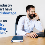 a business proffesional on the phone talking witha mobile and laptop